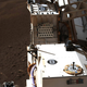 Mastcam-Z taking a photo of its calibration target on the rover’s deck.